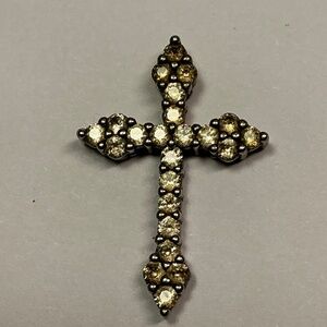 Sterling Silver Cross with clear stones. Signed SUN. 1 inch long